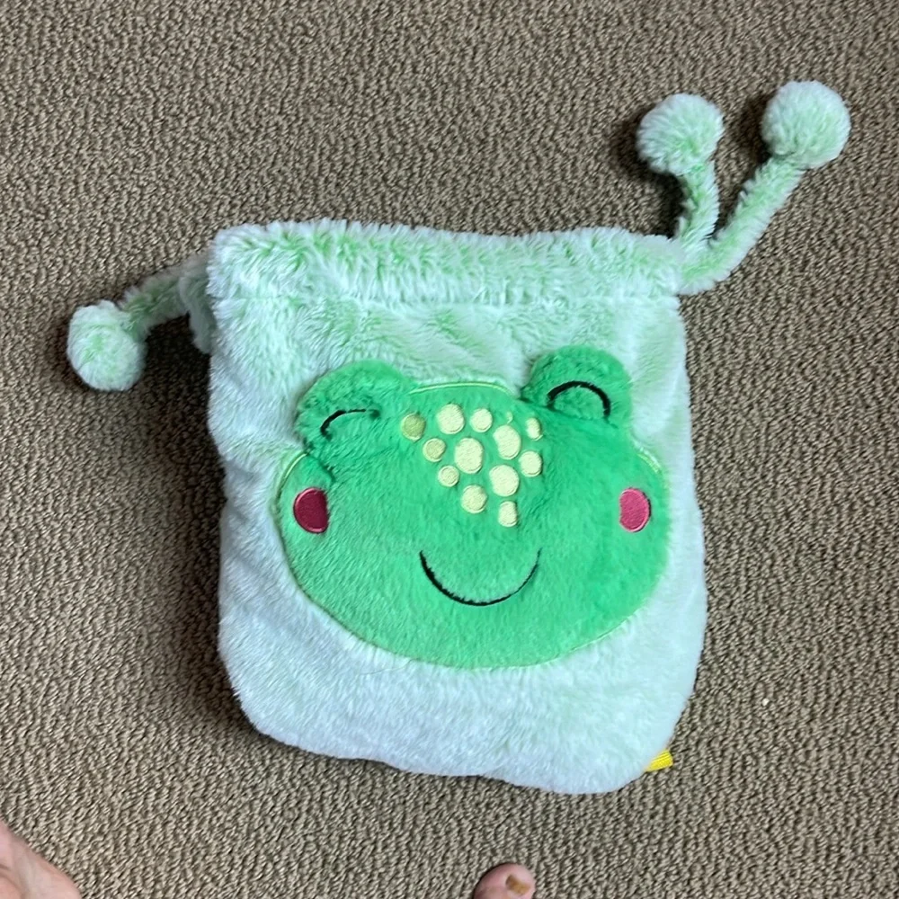 Frog backpack blanket. Very cute and soft.